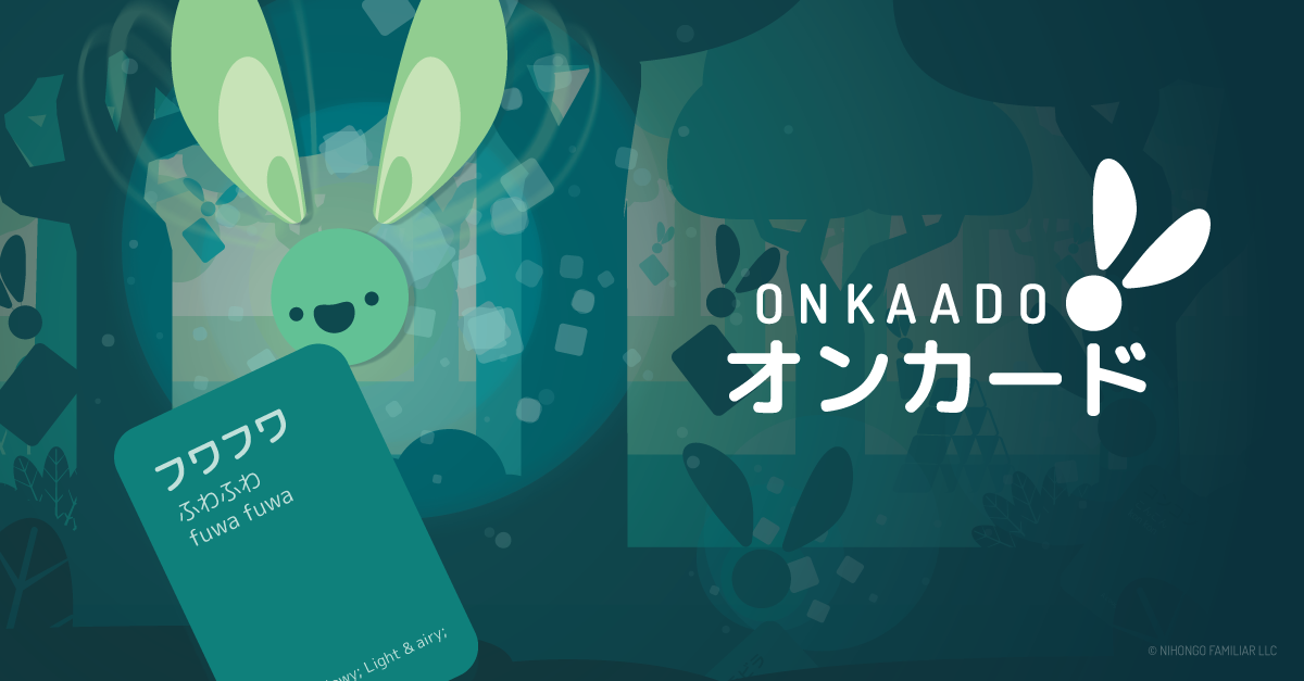 A fairy floating in a forest and holding a card with Japanese onomatopoeia on it. To its side, the text Onkaado in both Japanese katakana script and latin characters.